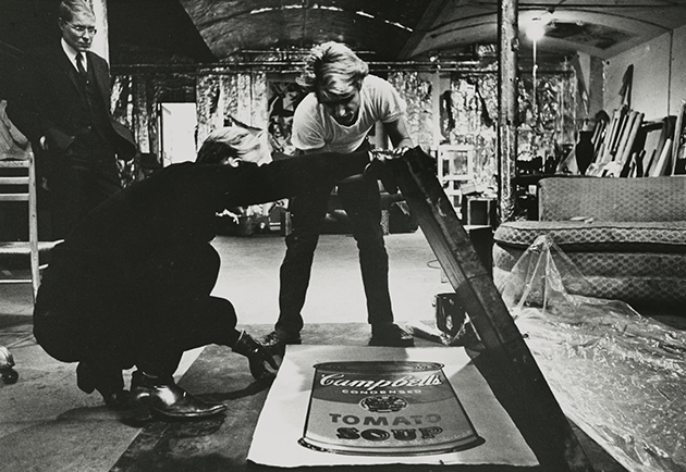 Andy Warhol silk screening Tomato, from Campbell’s Soup I, The Factory, New York City, circa 1968. Image: © Ugo Mulas Heirs. All rights reserved